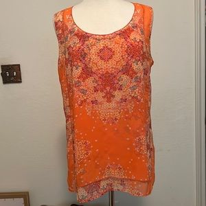 Bright floral orange lined accents of colors; magentas,lilacs and yellows.